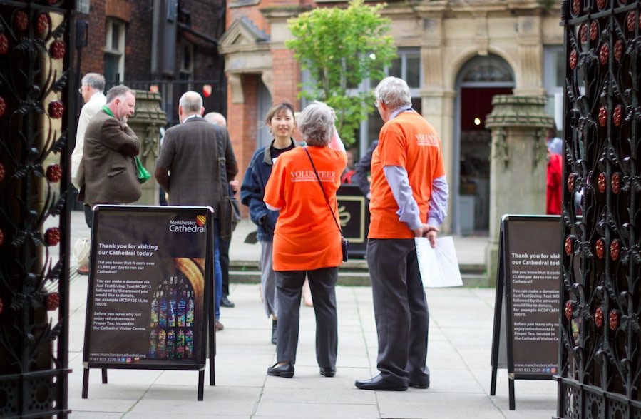 Volunteers outside the Cathedral