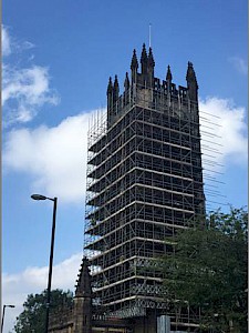 Why is Manchester Cathedral tower is covered in scaffolding?